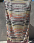 Earthy coloured towel shown in full length