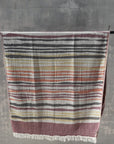 earthy coloured towel hanging