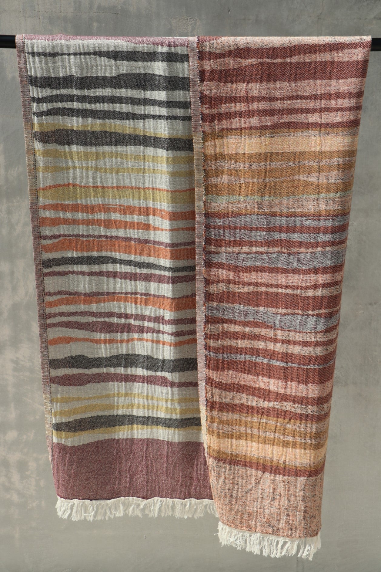 earthy coloured towel showing both sides