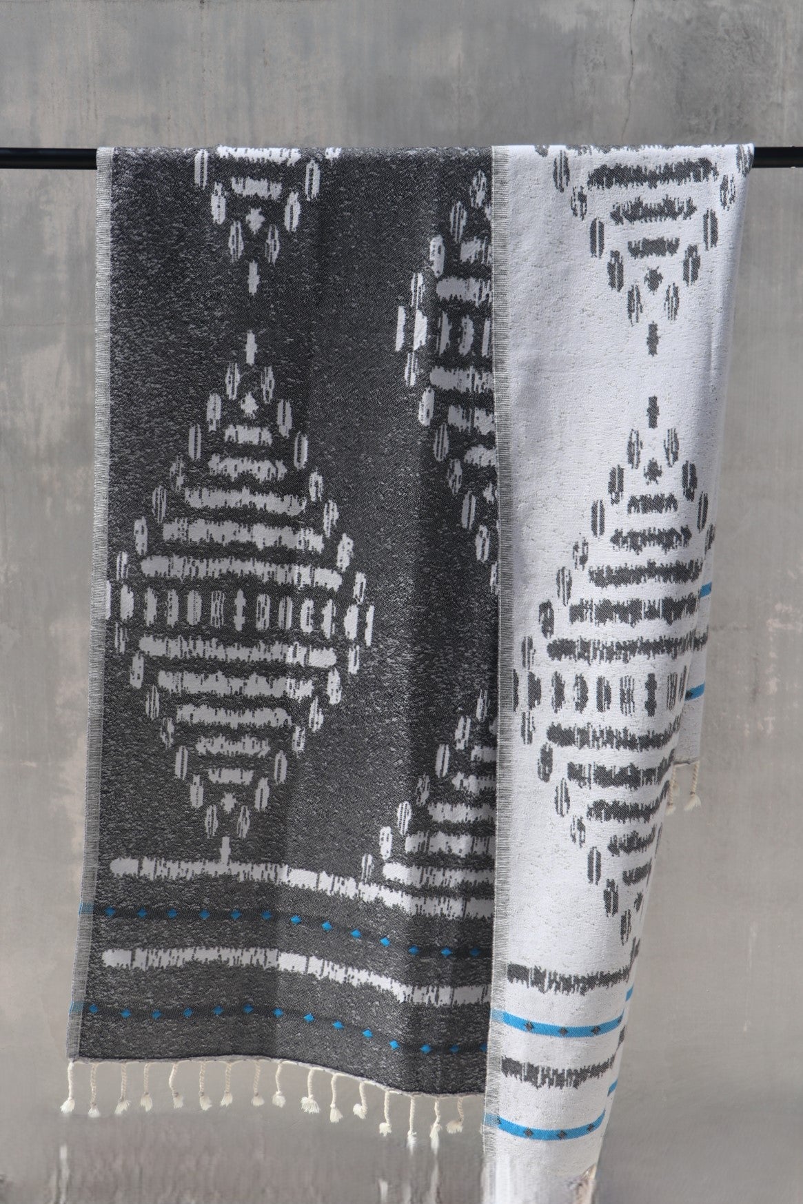 Bermagui black towel showing both sides