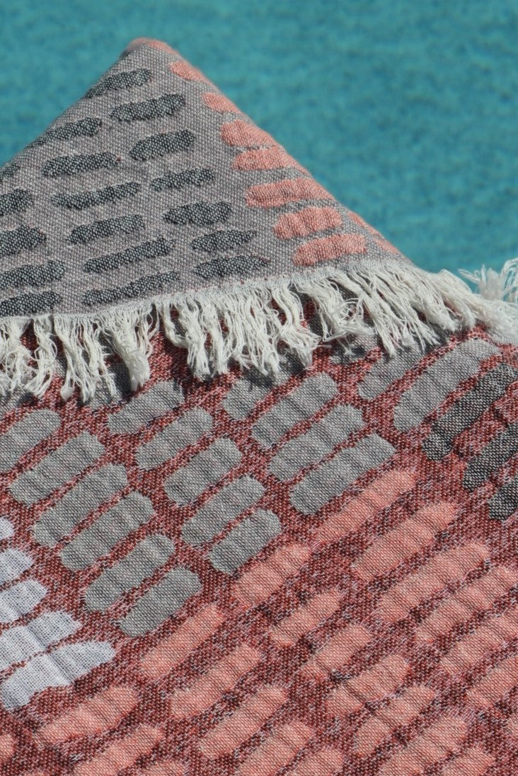 close up of pink and grey bowen turkish towel