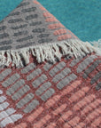 close up of pink and grey bowen turkish towel