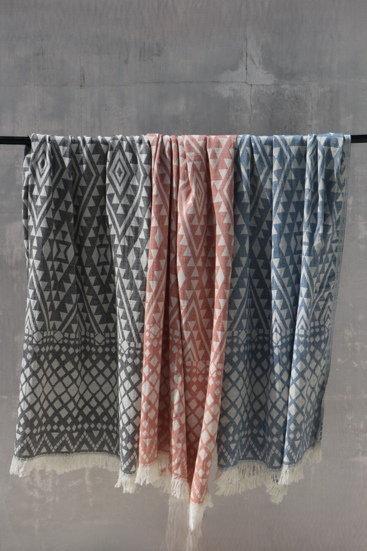 Burleigh beach Turkish towel hanging in 3 colours